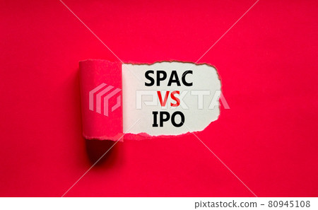 SPAC vs IPO symbol. Words 'SPAC, special purpose acquisition company vs IPO, initial public offering' behind torn purple paper on purple background, copy space. Business and SPAC vs IPO concept. SPAC vs IPO symbol. Words 'SPAC, special purpose acquisition company vs IPO, initial public offering' behind torn purple paper on purple background, copy space. Business and SPAC vs IPO concept. 80945108