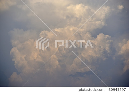 Blue and white cumulus clouds before a thunderstorm Blue and white cumulus clouds before a thunderstorm 80945597