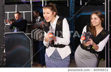 Two women having corporative entertainment 80946652