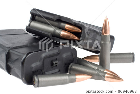 Clip of ammunition on a white. 80946968