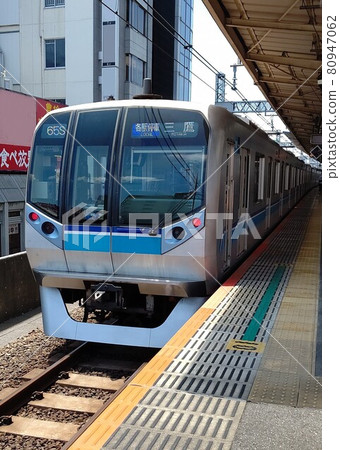 JR train Tokyo Metro Tozai Line at Tokyo Koenji Station 80947062
