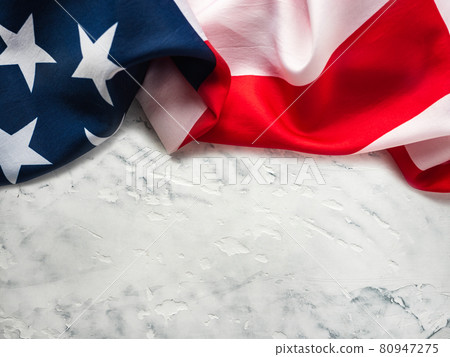 American Flag lying on an empty table American Flag lying on an empty table 80947275