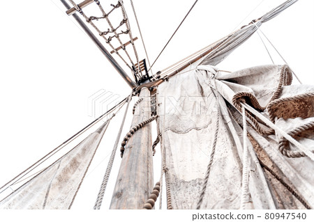 Wooden old ship in vintage style with all sails set in misty lake. Moody background. Wooden old ship in vintage style with all sails set in misty lake. Moody background. 80947540