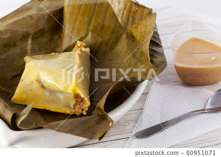Traditional dish from the city of Popayan in Colombia called tamales de pipian 80951071