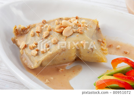 Traditional dish from the city of Popayan in Colombia called tamales de pipian 80951072