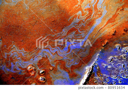 Oil flowing from industrial waste 80951634