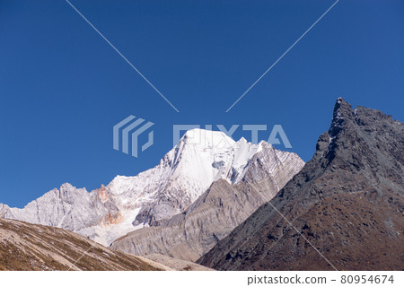 Beautiful snow mountain peak with clear blue sky in Yading natural reserve,Nature landscape 80954674
