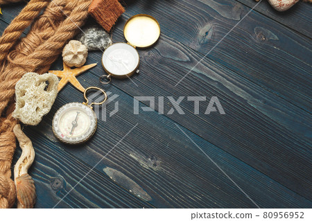 Nautical background. Sailing rope with a compass Nautical background. Sailing rope with a compass 80956952