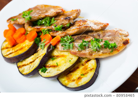 Roasted lamb meat with grilled eggplant Roasted lamb meat with grilled eggplant 80958465