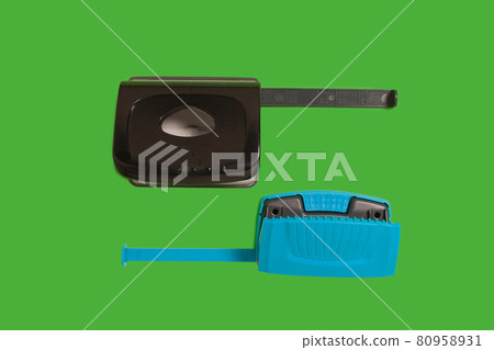 black and blue office hole punchers. office accessories. school black and blue office hole punchers. office accessories. school 80958931