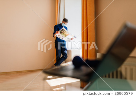 Businessman dressed in shirt having video call on computer in the home office, isolation Businessman dressed in shirt having video call on computer in the home office, isolation 80960579