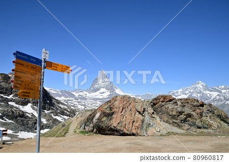Rottenboden station, hiking trail sign background with Matterhorn Rottenboden station, hiking trail sign background with Matterhorn 80960817