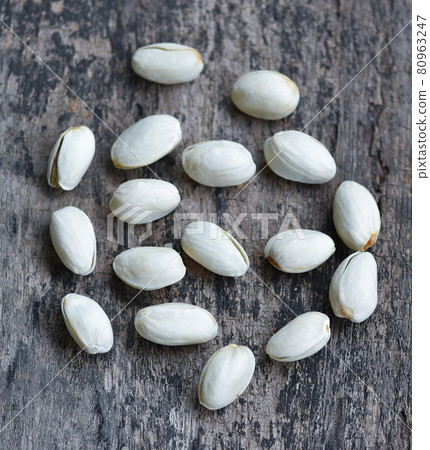 Pistachio on a wooden background 80963247