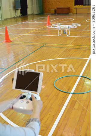 Do drone flight training at the gymnasium 80963265