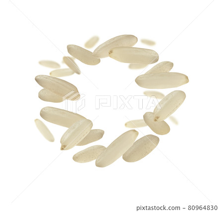 Raw rice levitates on a white background Raw rice levitates on a white background 80964830
