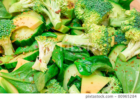 Fresh Green Salad of Avocado, Broccoli, Spinach and Cucumber for Body Detoxification 80965284