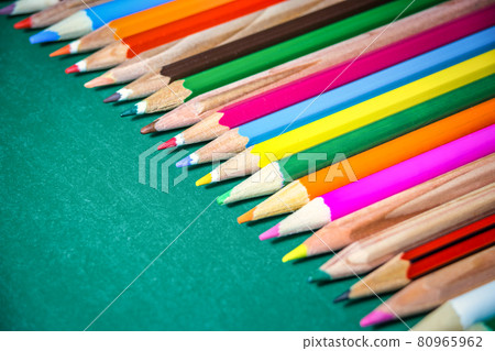 Colorful pencils on chalkboard Colorful pencils on chalkboard 80965962