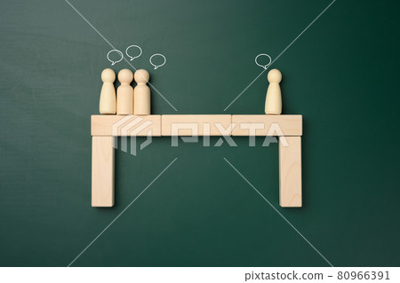 groups of wooden figures of men stand opposite each other. Conflict of interest concept, dialogue building, compromise solutions 80966391