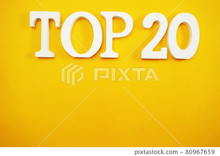 top twenty letters alphabet with space copy on yellow background 80967659