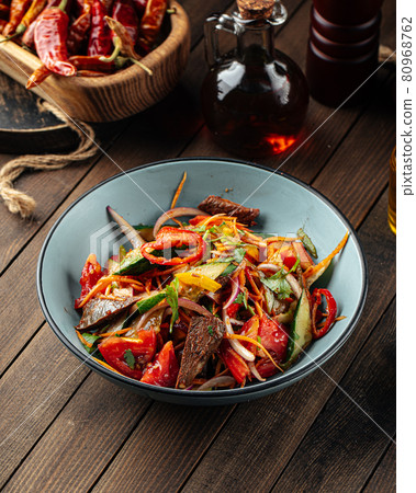 Chinese warm beef salad with vegetables Chinese warm beef salad with vegetables 80968762