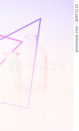 Few transparent bottles, water sprays. empty glass bottles. Vertical mobile format for smartpone stories. Few transparent bottles, water sprays. empty glass bottles. Vertical mobile format for smartpone stories. 80971210