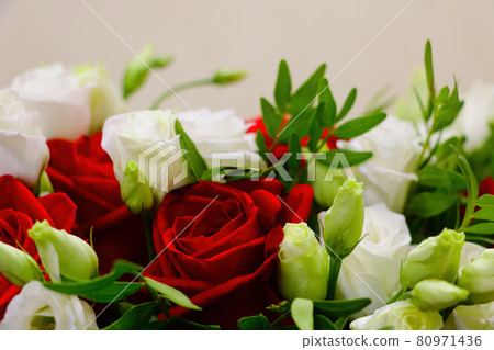 Red and white roses in a bouquet, congratulations on the holiday. Red and white roses in a bouquet, congratulations on the holiday. 80971436