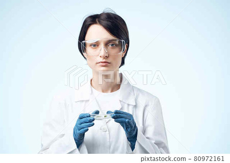 Woman in white coat biology laboratory research science Woman in white coat biology laboratory research science 80972161