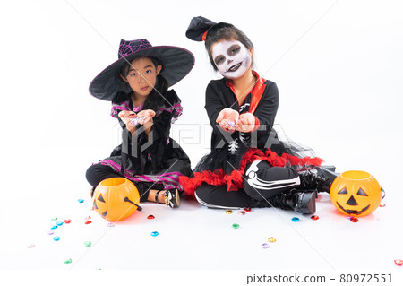 Portrait pair of little girls in Halloween and carnival costume isolated on white background Portrait pair of little girls in Halloween and carnival costume isolated on white background 80972551
