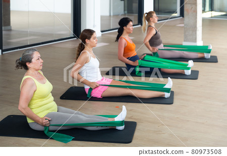 Aerobics pilates women with rubber bands Aerobics pilates women with rubber bands 80973508