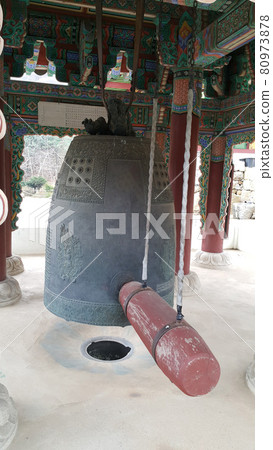 A temple bell with a loud ringing sound 80973878
