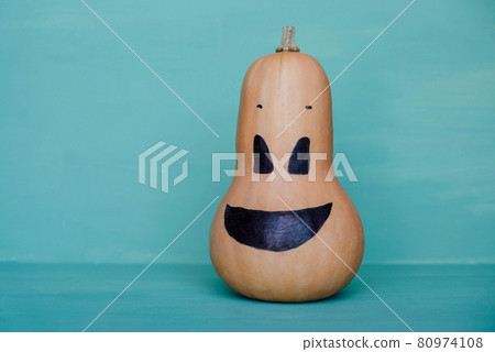 Cute and funny jack o lantern pumpkin smiling face made with butternut squash. Cute and funny jack o lantern pumpkin smiling face made with butternut squash. 80974108