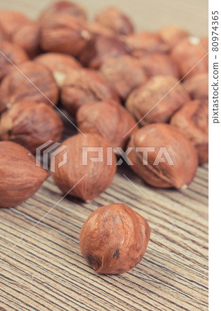 Fresh healthy hazelnuts containing vitamins and minerals. Nutritious eating Fresh healthy hazelnuts containing vitamins and minerals. Nutritious eating 80974365