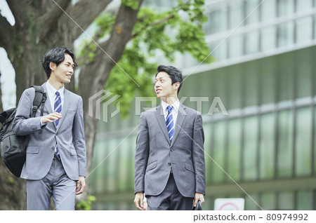 Walking suit businessman Walking suit businessman 80974992