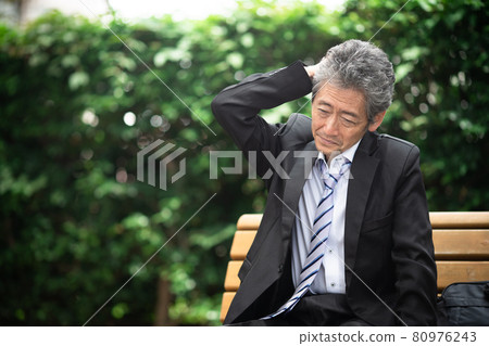 Businessmen worried outdoors Businessmen worried outdoors 80976243