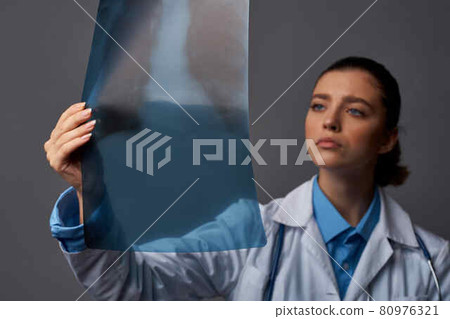 female doctor x-ray take a follow-up gown health professional job female doctor x-ray take a follow-up gown health professional job 80976321