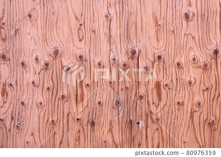 Surface of old plywood sheet with many cracks and knots, background Surface of old plywood sheet with many cracks and knots, background 80976359