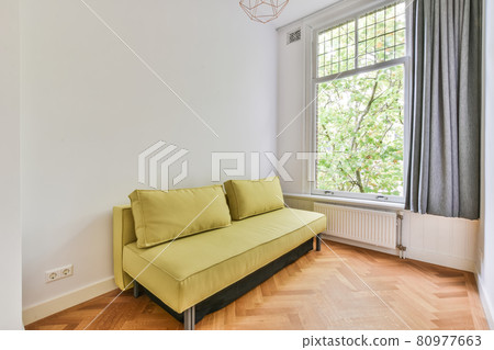 Modern furniture in a bright living room 80977663