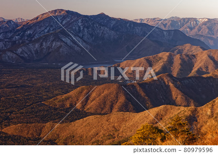 Lake Motosu and Mt. Kenashi in the morning seen from the Misaka Mountains and Mt. 80979596
