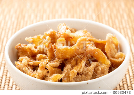 Deep-fried chicken skin. Deep-fried chicken skin. 80980478