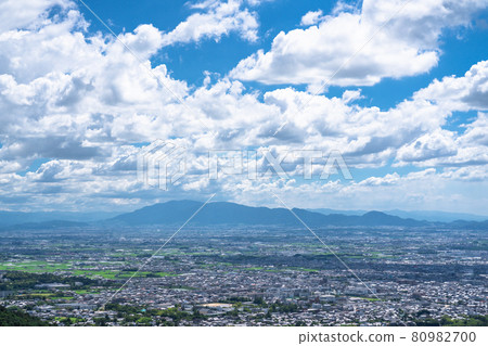《Nara Prefecture》 View of Mt. Wakakusa, cityscape of Nara city in the summer sky 《Nara Prefecture》 View of Mt. Wakakusa, cityscape of Nara city in the summer sky 80982700
