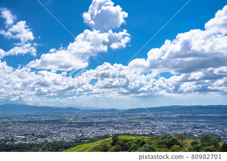 《Nara Prefecture》 View of Mt. Wakakusa, cityscape of Nara city in the summer sky 《Nara Prefecture》 View of Mt. Wakakusa, cityscape of Nara city in the summer sky 80982701