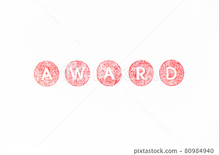 Red color rubber stamp in word award on white paper background 80984940