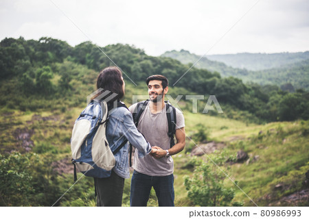 Couple lover standing and talking feeling happy and smiling together,Enjoying camping in nature 80986993