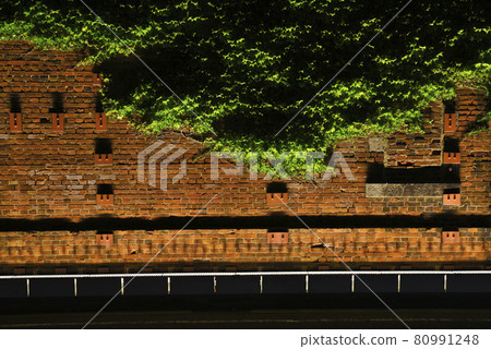 Brick wall of retro parking lot in Mojiko retro district 80991248