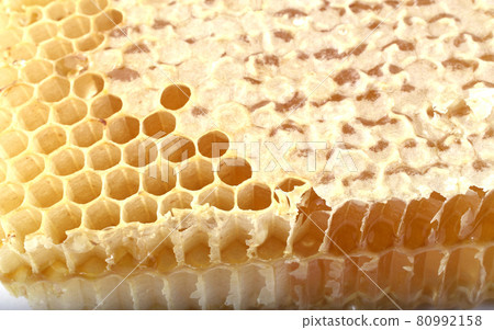Yellow honeycomb background Yellow honeycomb background 80992158