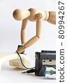 A drawing doll with a bugging device set on the handset 80994267