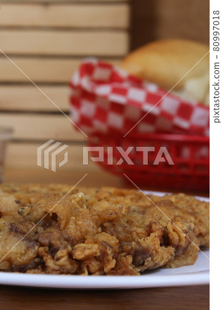 Chicken Fried Steak and Gravy With Mashed Potatoes in Rural Cafe Restaurant Chicken Fried Steak and Gravy With Mashed Potatoes in Rural Cafe Restaurant 80997018