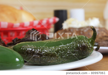 Roasted Green Jalapeno Peppers With Mushrooms in Rural Cafe 80997061