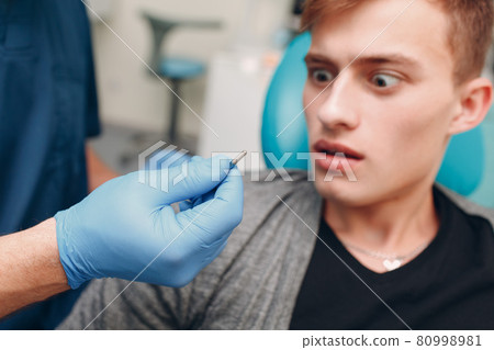 Dentistry. Dental clinic. Doctor and patient. Teeth health. 80998981