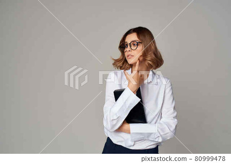 Business woman in white shirt documents professional office Business woman in white shirt documents professional office 80999478